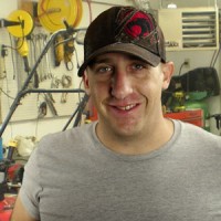 Lyle Rogers Smiling man in a baseball cap